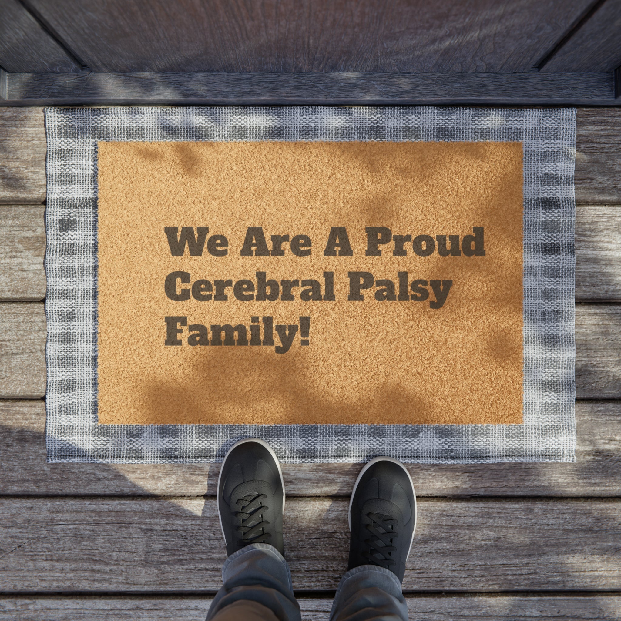 We Are A Proud Cerebral Palsy Family doormat With man standing in front of doormat