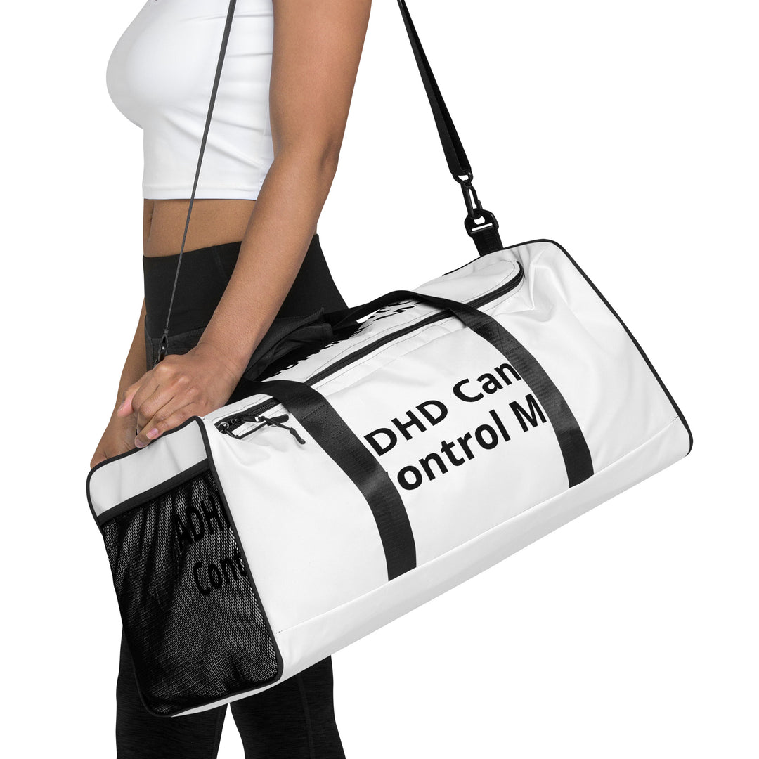 Woman holding duffle bag