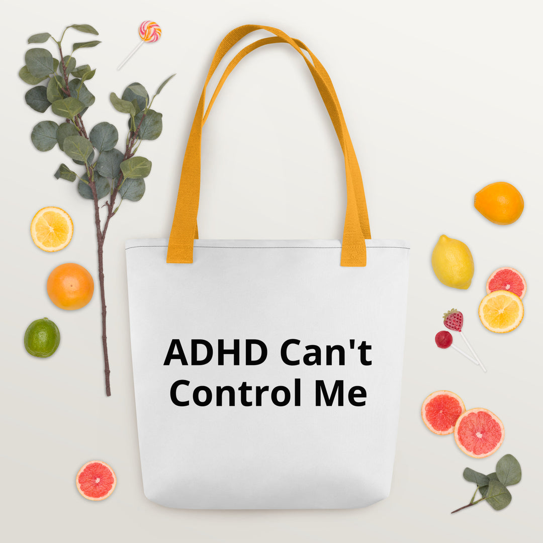 White tote bag with yellow handle and black writing on both sides (wording in product title)