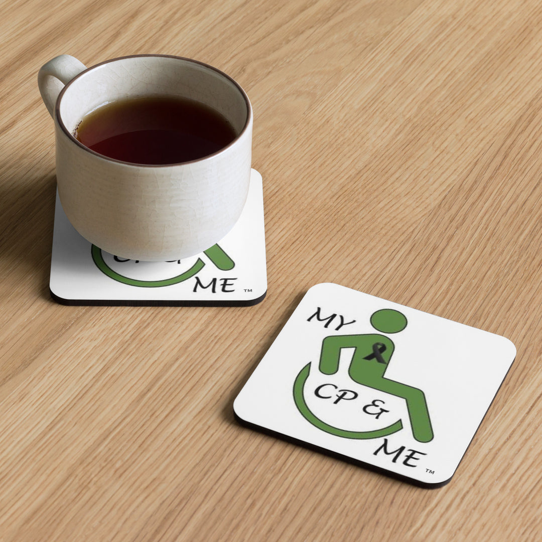 2 logo coasters on a wooden surface, one of the two coaster has a hot drink on it