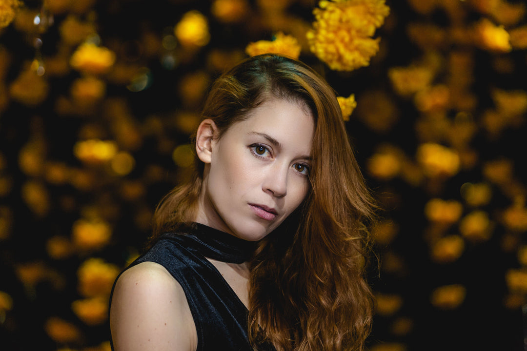 Woman with brown hair poses 