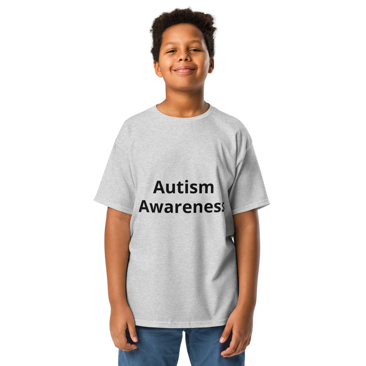 Kid wearing sport grey colored t-shirt with black wording “Autism Awareness”